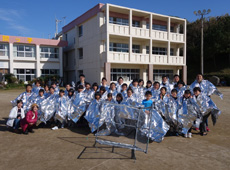 Students dressed to act as human reflectors. The radio-wave reflectors are in the foreground.