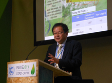 Kenichi Shishido presenting the JICA-JAXA tropical forest monitoring system at COP 21