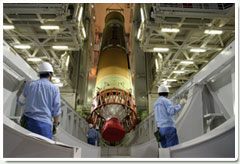 The H-IIA rocket's first stage, erected at VAB