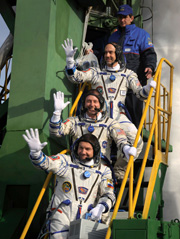Richard Garriott boarding the Soyuz spacecraft (second from the top) (Courtesy of NASA)