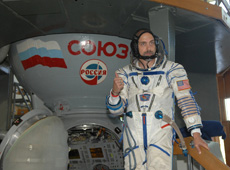 In front of the simulator of the Soyuz spacecraft (Courtesy of Richard Garriott)