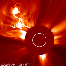 Coronal mass ejection (CME) observed by SOHO. The white circle indicates the location of the Sun. (courtesy: SOHO/LASCO (ESA/NASA))