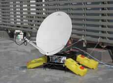 One-meter antenna for KIZUNA, set up at a local disaster-management office in an affected area