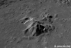 The central peak of the Tycho Crater imaged by the terrain camera. Its peak is 2,480 meters from the crater floor. There is a layer of anorthosite in the subsurface of the central peak.