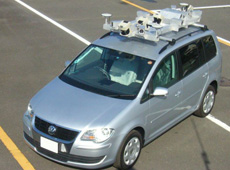 Vehicle loaded with a prototype MICHIBIKI receiver and a system that automatically collects cartographic information. (courtesy: Mitsubishi Electric Corporation.)