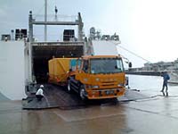 The DRTS is being unloaded from a ship at Nishinoomote Port in Tanegashima Island.