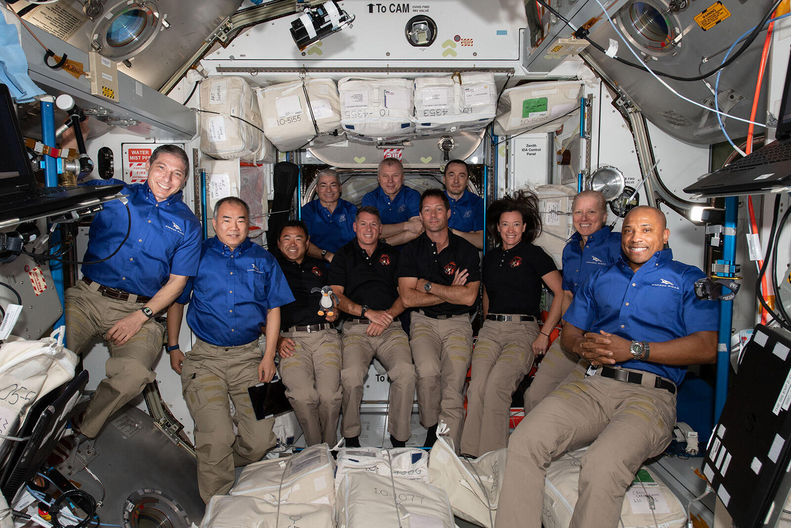 ISS crew, including HOSHIDE (third from left) and NOGUCHI (second from left) who started his stay in November 2020, communicating with the ground station (photo taken April 24, 2021 (JST))