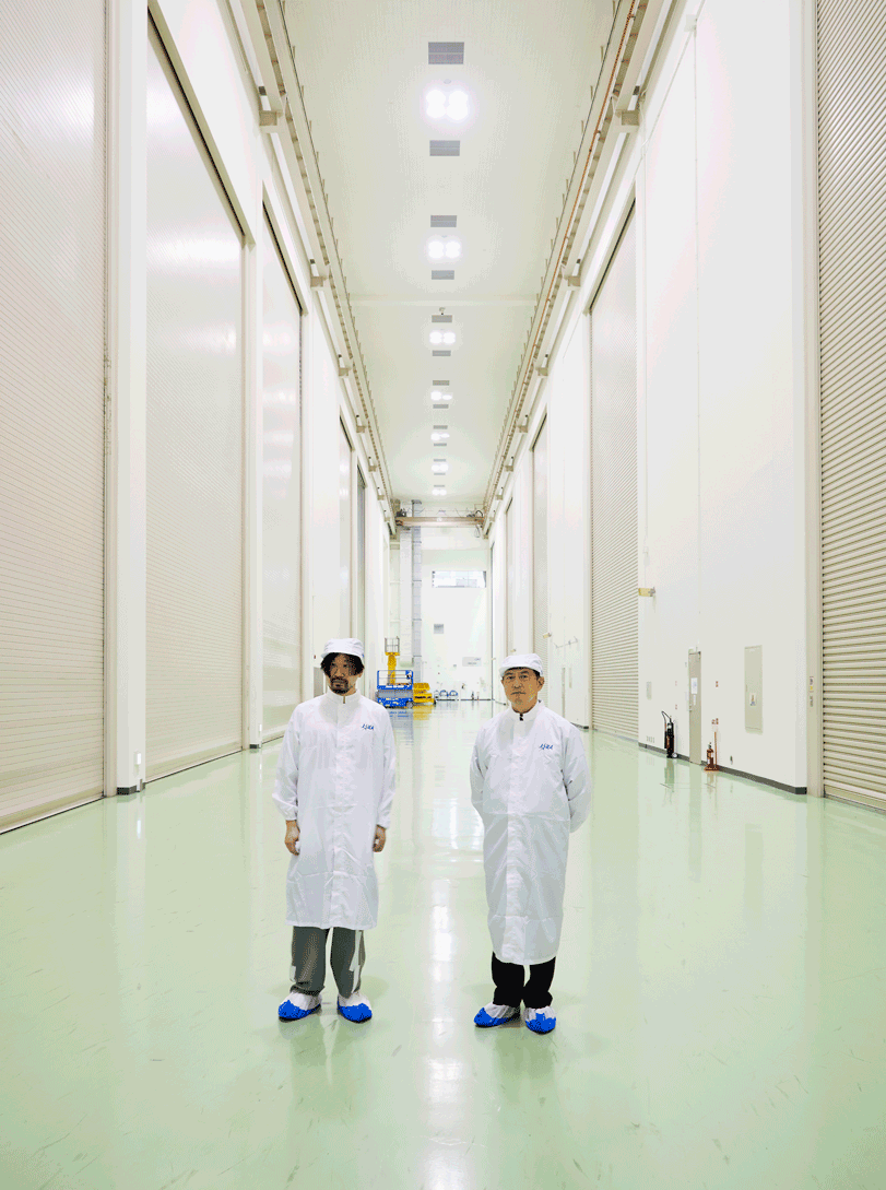 A corridor in the Spacecraft Integration and Test Building, equipped with huge shutters to accommodate large satellites