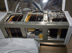 Small CubeSat satellites set in a Satellite Install Case (courtesy: JAXA/NASA)