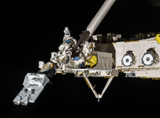 J-SSOD system being moved into place by Kibo’s robotic arm (courtesy: JAXA/NASA)