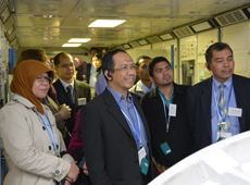 Touring a life-size replica of Kibo during the APRSAF-21 technical tour