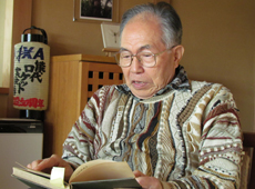 Ryojiro Akiba with the book Rocket Propulsion Elements