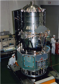 Infrared astronomical satellite Akari in the laboratory. One can see the telescope's cover, or aperture lid at the top