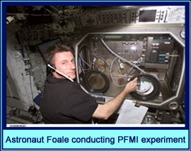 Astronaut Foale conducting PFMI experiment
