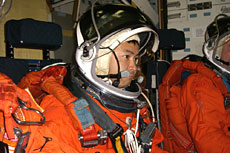 Astronaut Akihiko Hoshide training for an emergency escape from the Space Shuttle.