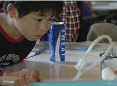 A child engrossed in a science experiment