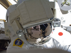 Astronaut Hoshide on his first spacewalk (courtesy: JAXA/NASA) 