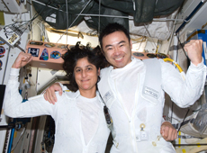 Astronauts Hoshide and Williams after completing the installation of a spare MBSU (courtesy: JAXA/NASA)