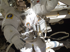 Astronaut Akihiko Hoshide performing a spacewalk. The internal pressure of the spacesuit is maintained at 0.3 atm. (courtesy: JAXA/NASA)