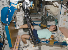 Astronaut Wakata exercising (Courtesy of NASA)
