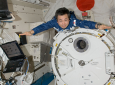 Astronaut Wakata traveling in Kibo (Courtesy of NASA)