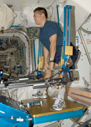 Astronaut Koichi Wakata training his muscles (Courtesy: NASA/JAXA)