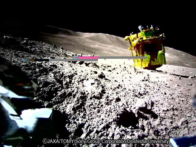 An image of SLIM and its vicinity on the lunar surface, captured by the transformable nano rover LEV-2